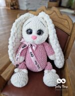 A milky white rabbit in a pink pijama - Image 3