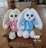 A milky white rabbit in a pink pijama - Image 5