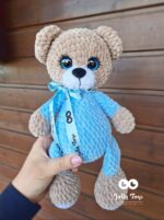Teddy bear boy in a blue pajamas.Personalized crochet toy . Teddy with name and birth details