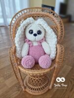 A milky white bunny in dull pink bow pants. A stylish gift