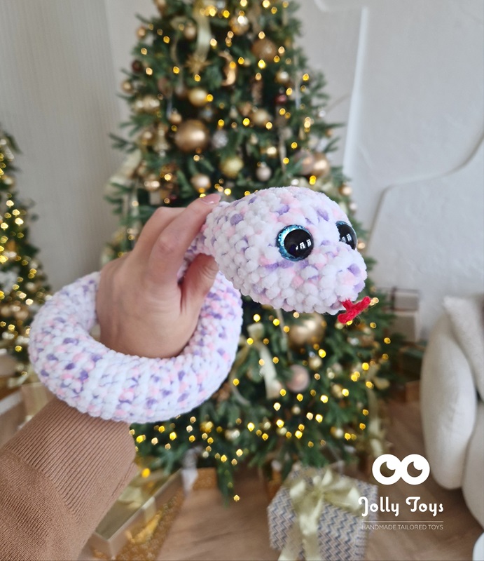 20241126_131809_1735326803001 A cute little spotted snake is the symbol of 2025 - Image 3